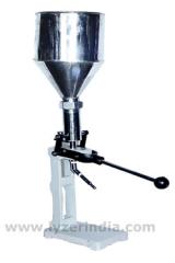 TUBE FILLING MACHINE :